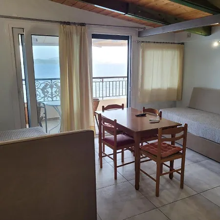 Logan's Lägenhetshotell Nidhrion